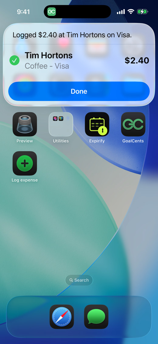 A notification reading 'Logged $2.40 at Tim Hortons on Visa', over the iPhone Home Screen with GoalCents closed.